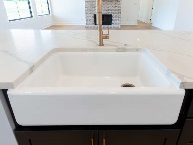 White sink in the kitchen from the Wright Project by LaFollette Custom Homes.