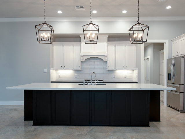 Black and white kitchen of the Roznovsky Project by LaFollette Custom Homes.