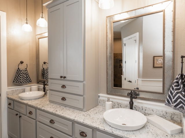 Countertops of the Chisam Project&#039;s master bath by LaFollette Custom Homes.