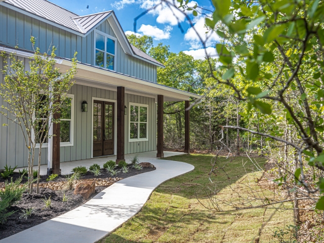 The Bishop Project by LaFollette Custom Homes with a large porch.