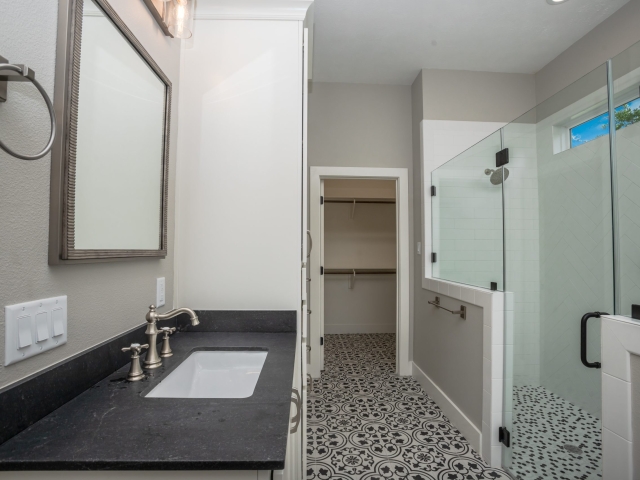 Master bath of the Bishop Project with tile flooring.