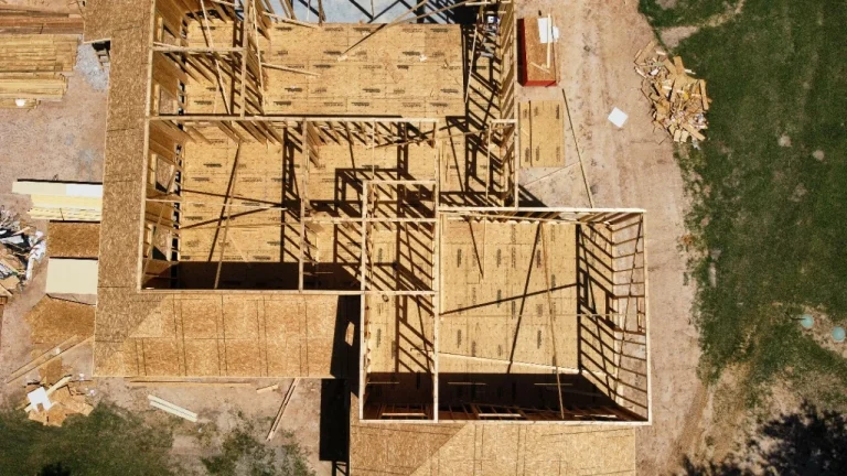 Photo of framed out house during new construction