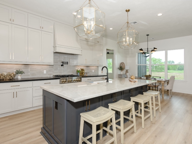 Kitchen of the Lakecrest Project by LaFollette Custom Homes with barstool seating.
