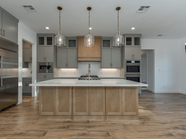 Wood detailing is featured in the kitchen of the Berryman Project by LaFollette Custom Homes.