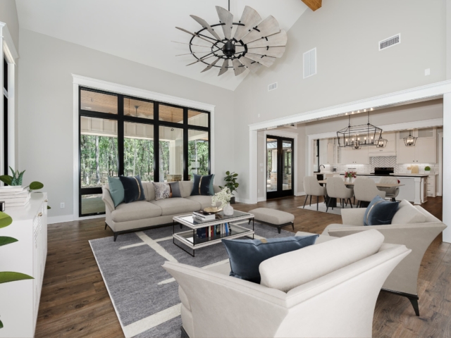 Living room of the Torres Project by LaFollette Custom Homes with blue and cream details.
